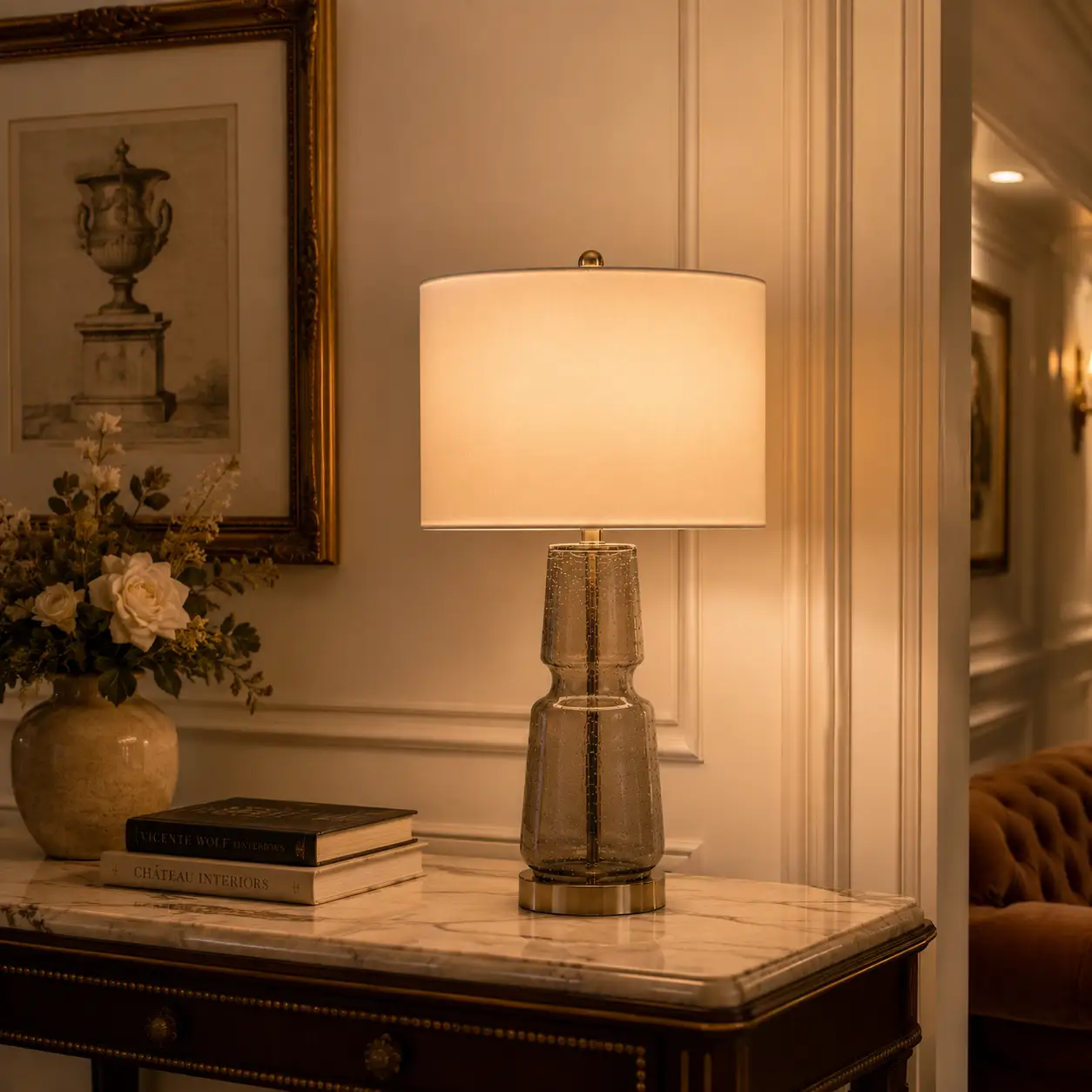 The Aeon Textured Glass Table Lamp in an Amber Finish for a Neoclassical Hotel Suite