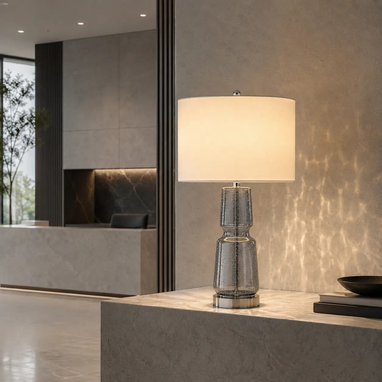 The Aeon Textured Glass Table Lamp in a Modern Luxury Lounge Interior